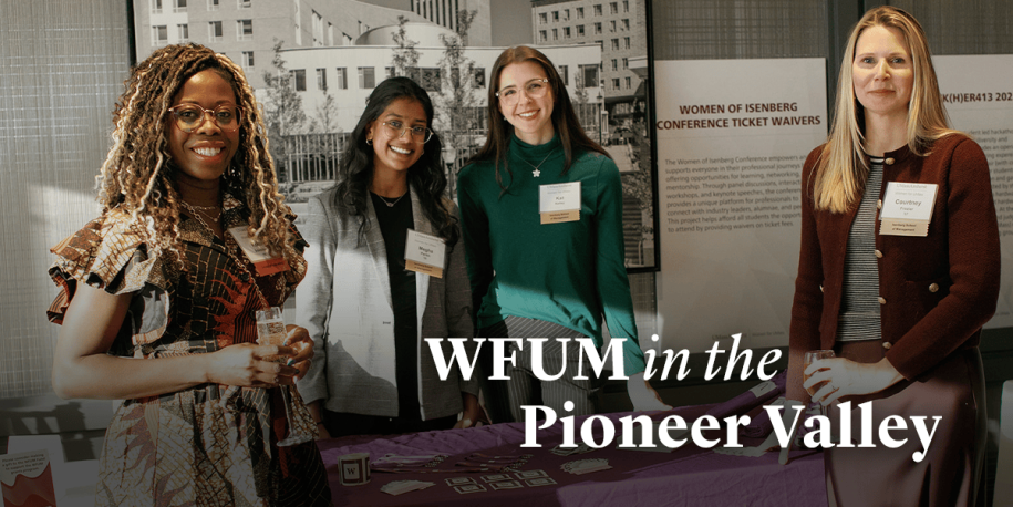 Text: WFUM in the Pioneer Valley, Image: 4 women standing at table with information on grant success