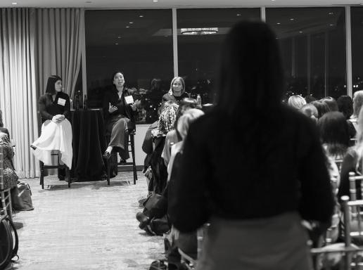 Person speaking to panel at WFUM event